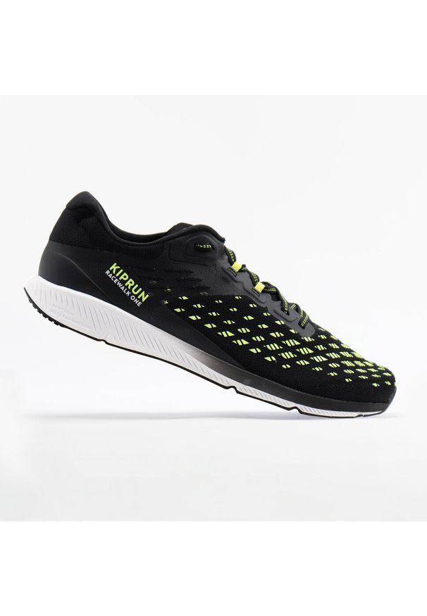 KIPRUN - Buty do chodu sportowego Kiprun Racewalk One. Kolor: czarny, zielony, żółty, wielokolorowy. Materiał: kauczuk. Szerokość cholewki: normalna. Wzór: geometria. Sport: turystyka piesza