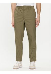 New Balance Spodnie dresowe MP41575 Zielony Regular Fit. Kolor: zielony. Materiał: bawełna #1