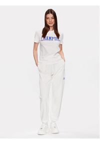 Champion Spodnie dresowe 116083 Biały Regular Fit. Kolor: biały. Materiał: bawełna, dresówka, syntetyk
