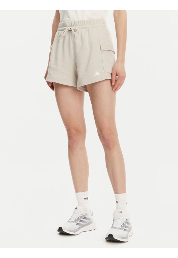 Adidas - adidas Szorty sportowe Essentials Small Logo JC5699 Beżowy Loose Fit. Kolor: beżowy. Materiał: bawełna, syntetyk