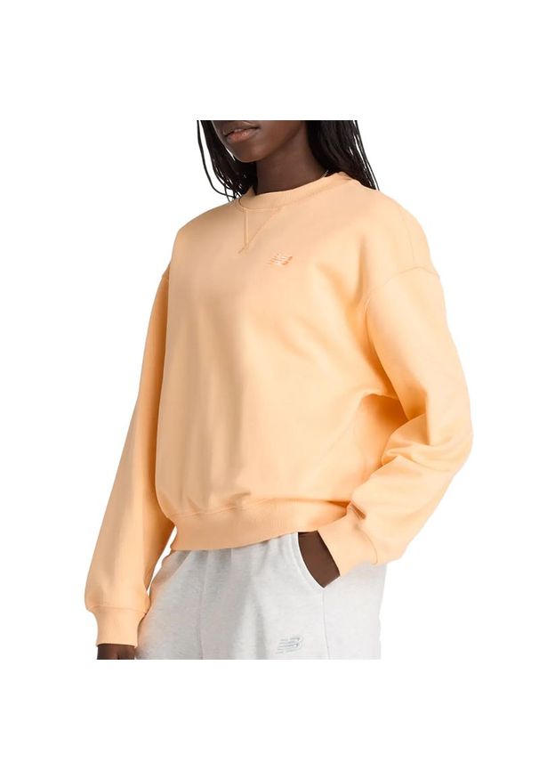 Bluza New Balance WT41500PAE - pomarańczowa. Okazja: na co dzień. Kolor: pomarańczowy. Materiał: tkanina, dresówka, prążkowany, bawełna. Styl: klasyczny, casual