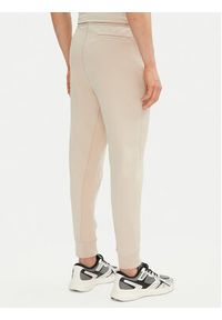 BOSS Spodnie dresowe Hadiko 50537198 Beżowy Regular Fit. Kolor: beżowy. Materiał: bawełna