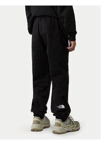The North Face Spodnie dresowe Essential NF0A8BHS Czarny Regular Fit. Kolor: czarny. Materiał: syntetyk, bawełna #4