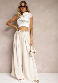 Renee - Jasnobeżowe Szerokie Spodnie High Waist Zapinane na Suwak z Wiązaniem w Talii Vikonnia. Okazja: na co dzień. Stan: podwyższony. Kolor: beżowy. Styl: klasyczny, casual, elegancki