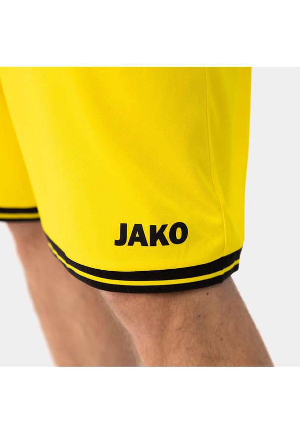Szorty Jako Center 2.0. Kolor: wielokolorowy, żółty, czarny. Sport: piłka nożna, fitness