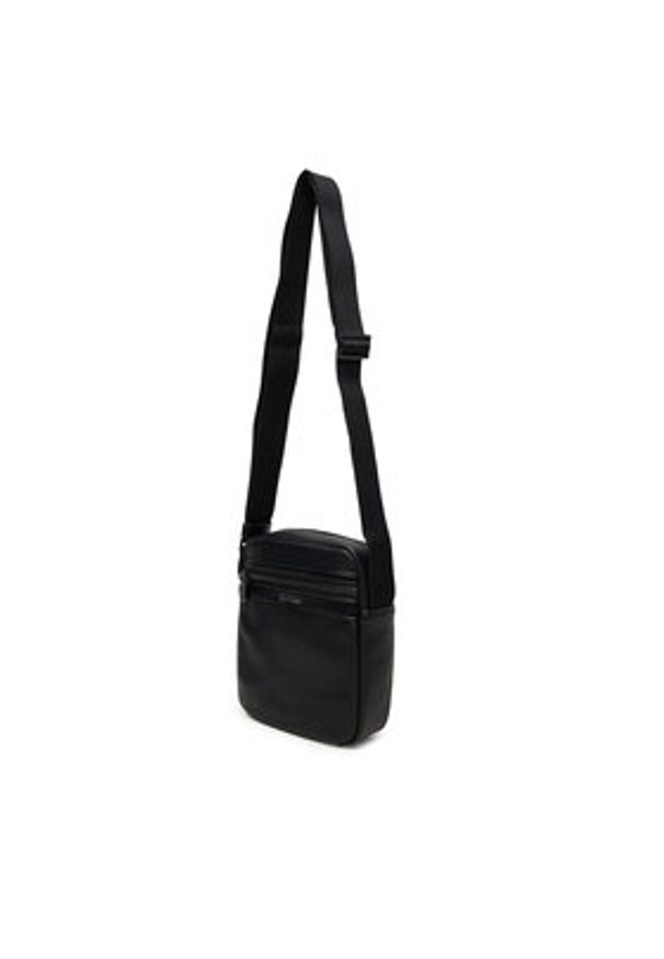 Calvin Klein Saszetka Zip Reporter LV04D3264G Czarny. Kolor: czarny. Materiał: skóra