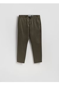 Reserved - Spodnie carrot fit - zielony. Kolor: zielony. Materiał: tkanina