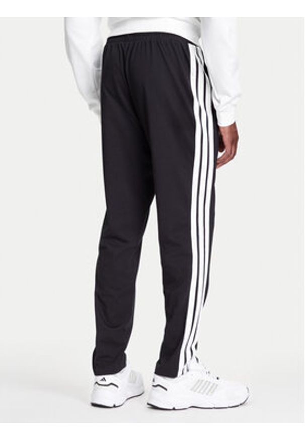 Adidas - adidas Spodnie dresowe Essentials 3-Stripes JE6430 Czarny Regular Fit. Kolor: czarny. Materiał: bawełna