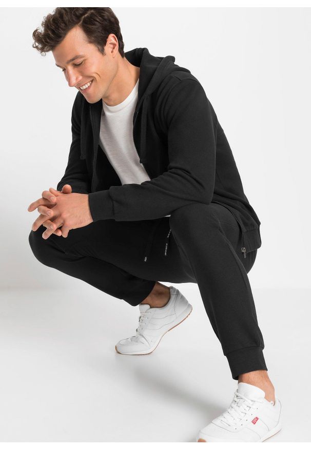 bonprix - Spodnie sportowe. Kolor: czarny. Styl: sportowy