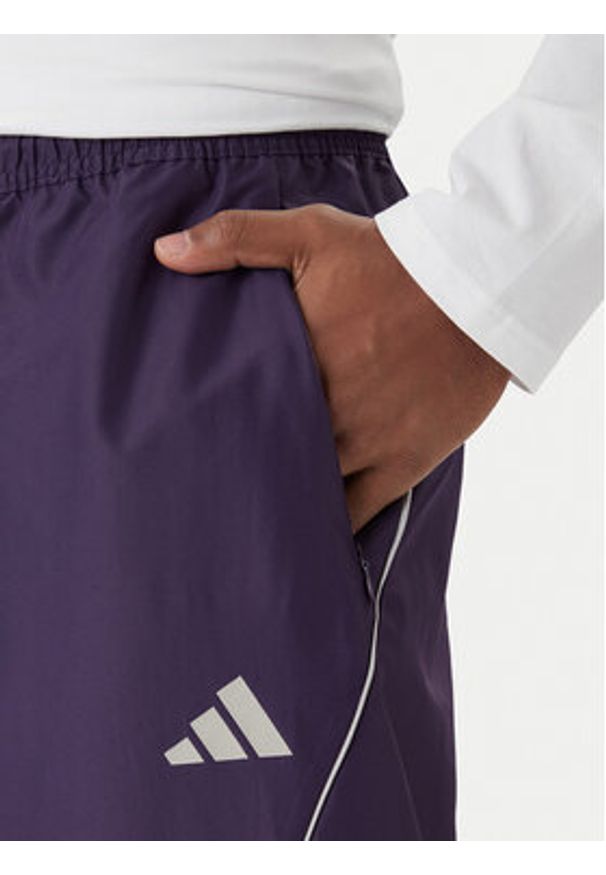 Adidas - adidas Spodnie dresowe Stadium JX5610 Fioletowy Loose Fit. Kolor: fioletowy. Materiał: syntetyk