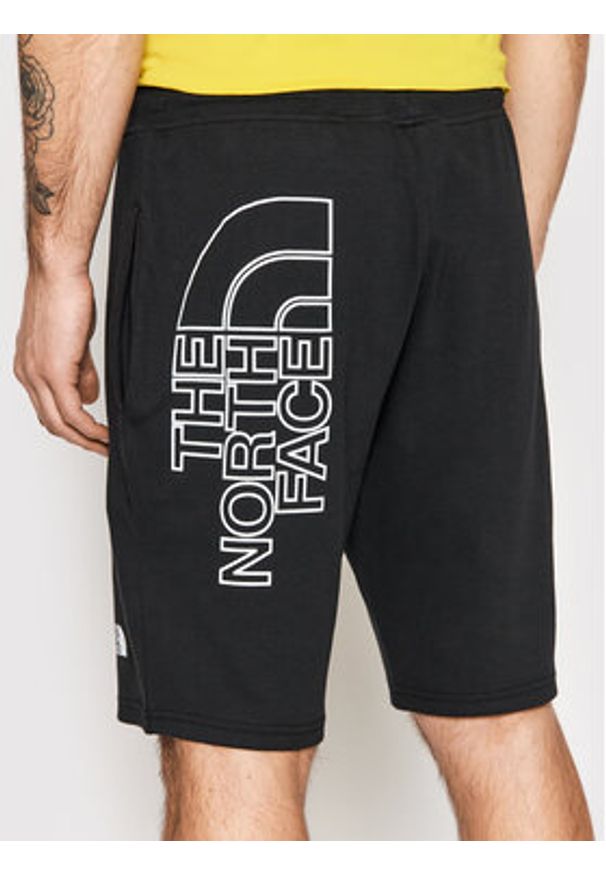 The North Face Szorty sportowe Graphic NF0A3S4F Czarny Regular Fit. Kolor: czarny. Materiał: bawełna. Styl: sportowy