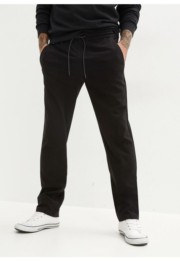 bonprix - Spodnie z gumką w talii, ze stretchem, krój relaxed fit, straight. Kolor: czarny