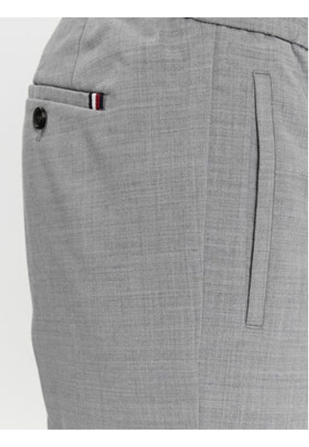 TOMMY HILFIGER - Tommy Hilfiger Spodnie materiałowe Dc Chelsea Po Travel Wool MW0MW33930 Szary Regular Fit. Kolor: szary. Materiał: syntetyk