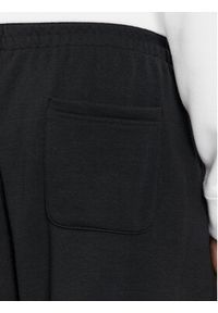 New Balance Spodnie dresowe MP41519 Czarny Relaxed Fit. Kolor: czarny. Materiał: bawełna