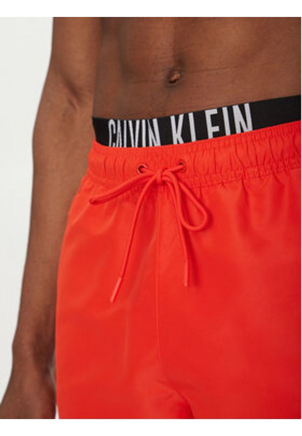 Calvin Klein Swimwear Szorty kąpielowe KM0KM01093 Czerwony Regular Fit. Kolor: czerwony. Materiał: syntetyk