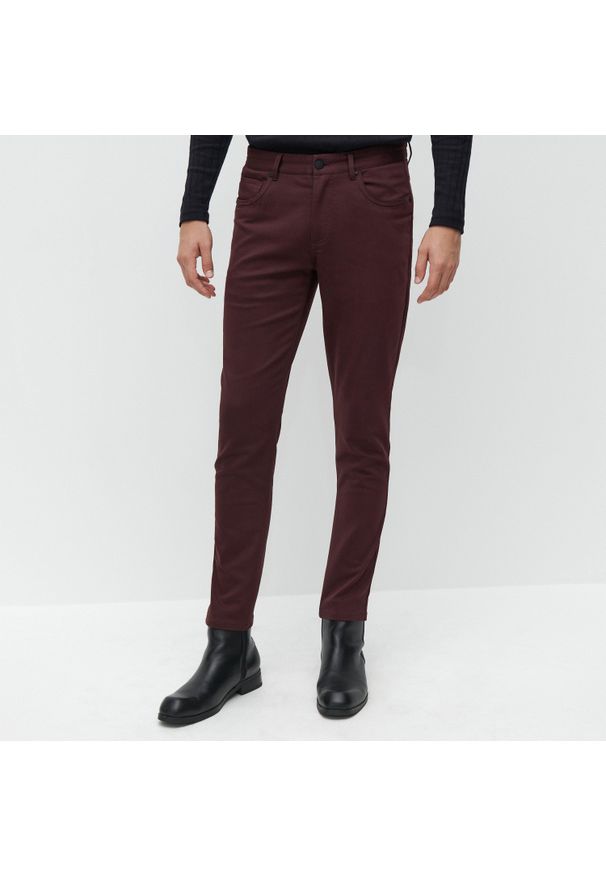 Reserved - Spodnie super slim fit - Fioletowy. Kolor: fioletowy