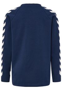 T-shirt chłopięcy Hummel hmlBOYS. Kolor: niebieski. Materiał: bawełna. Długość rękawa: długi rękaw. Sezon: zima