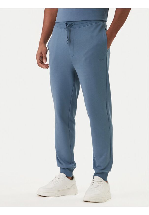 Hugo - HUGO Spodnie dresowe Dayote232 50489617 Niebieski Regular Fit. Kolor: niebieski. Materiał: bawełna