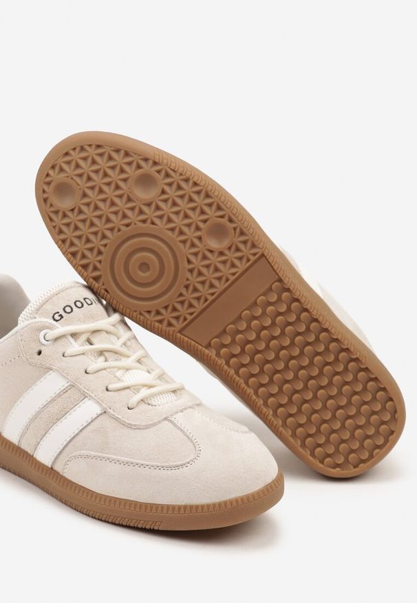 Renee - Beżowe Sneakersy ze Skóry Naturalnej na Płaskiej Podeszwie Wykończone Paskami Navinda. Okazja: na spotkanie biznesowe, na co dzień. Zapięcie: pasek. Kolor: beżowy. Materiał: skóra. Obcas: na płaskiej podeszwie