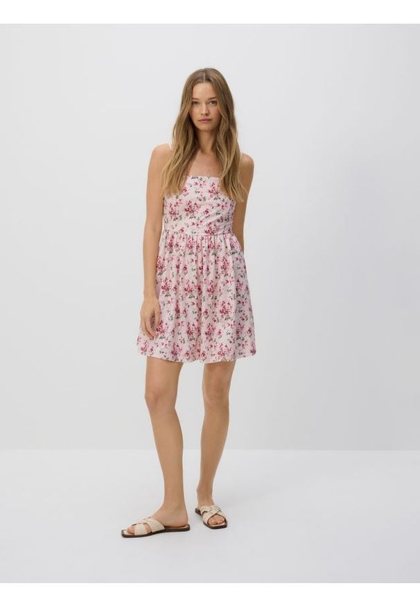 Reserved - Wzorzysta sukienka mini - wielobarwny. Materiał: wiskoza, dzianina. Długość: mini