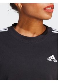Adidas - adidas Bluza Essentials 3-Stripes Sweatshirt IC8766 Czarny Loose Fit. Kolor: czarny. Materiał: bawełna