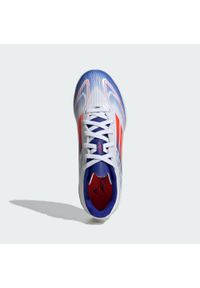 Adidas - Buty F50 League TF Kids. Kolor: biały, czerwony, wielokolorowy, niebieski. Materiał: materiał