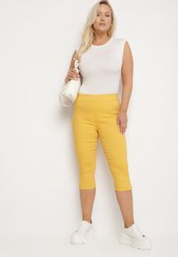 Born2be - Żółte Spodnie z Bawełny o Kroju Capri Dolonisa. Okazja: na co dzień. Kolor: żółty. Materiał: bawełna. Styl: młodzieżowy, elegancki, casual #5