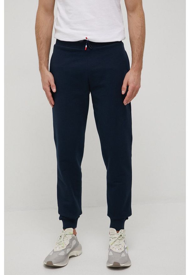 Rossignol spodnie dresowe bawełniane męskie kolor granatowy gładkie. Kolor: niebieski. Materiał: bawełna, dresówka. Wzór: gładki