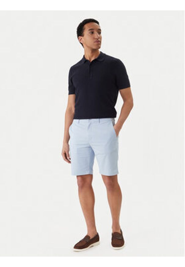 TOMMY HILFIGER - Tommy Hilfiger Szorty materiałowe Denton 9.5 MW0MW42351 Niebieski jasny Slim Fit. Kolor: niebieski. Materiał: bawełna