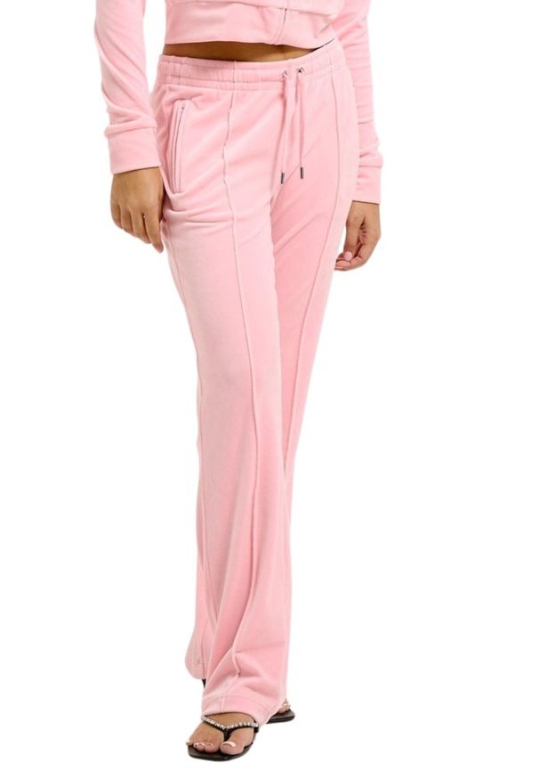 Juicy Couture - JUICY COUTURE Różowe damskie spodnie dresowe Tina Trackpants. Kolor: różowy. Materiał: dresówka