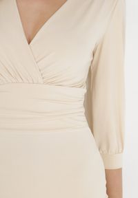 Born2be - Beżowa Sukienka Agathinca. Kolor: beżowy. Materiał: wiskoza, dzianina. Długość rękawa: długi rękaw. Długość: mini #2