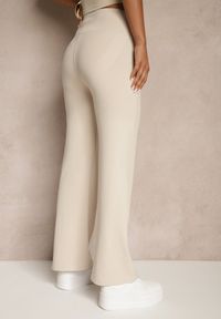 Renee - Beżowe Spodnie Flare High Waist z Szeroką Gumką w Pasie Idalania. Okazja: na co dzień. Stan: podwyższony. Kolor: beżowy. Styl: casual, elegancki