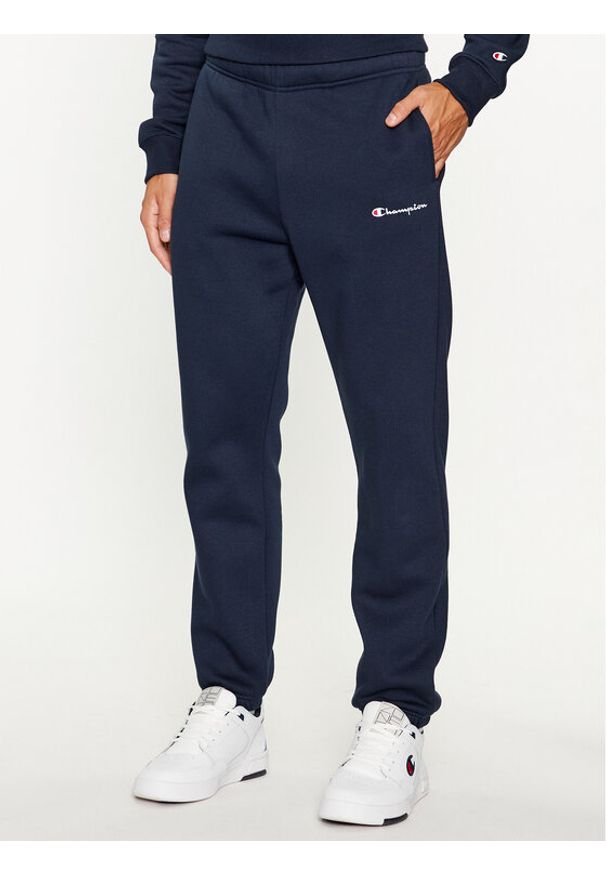 Champion Spodnie dresowe Elastic Cuff Pants 219420 Granatowy Comfort Fit. Kolor: niebieski. Materiał: syntetyk, bawełna