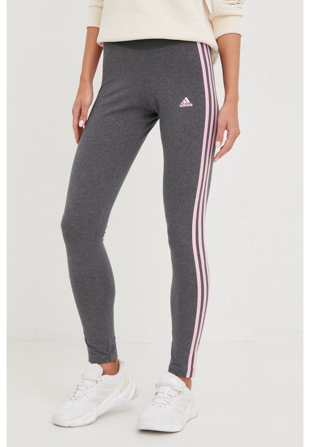 Adidas - adidas legginsy damskie kolor szary melanżowe. Kolor: szary. Materiał: materiał. Wzór: melanż