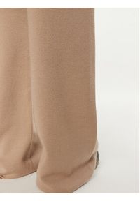 Calvin Klein Spodnie dresowe K20K207680 Beżowy Relaxed Fit. Kolor: beżowy. Materiał: wełna #5