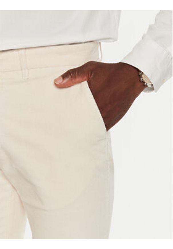 TOMMY HILFIGER - Tommy Hilfiger Spodnie materiałowe MW0MW32932 Écru Regular Fit. Materiał: sztruks