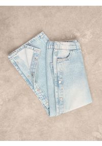 Reserved - Jeansy wide leg z napami - niebieski. Kolor: niebieski