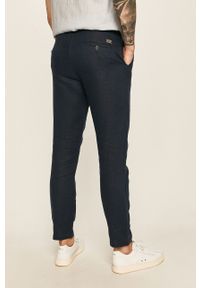Guess Jeans - Spodnie. Kolor: niebieski. Materiał: bawełna, jeans, materiał, tkanina, len, poliester. Wzór: gładki #2