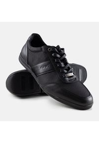 Czarne męskie sneakersy GOE NN1N4004. Nosek buta: okrągły. Kolor: czarny. Materiał: guma. Sport: turystyka piesza