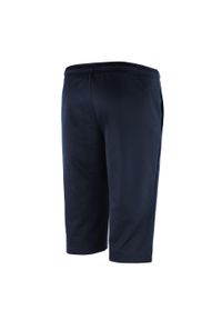 Spodnie 3/4 piłkarskie dla dzieci LOTTO JR DELTA MID. Kolor: niebieski. Materiał: dresówka. Styl: sportowy