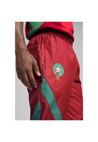 Puma - Męskie tkane spodnie przedmeczowe Maroko PUMA Intense Red Archive Green. Kolor: czerwony, wielokolorowy, zielony
