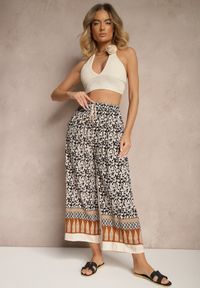 Renee - Czarne Spodnie z Bawełny High Waist z Abstrakcyjnym Wzorem Lisathiela. Okazja: na co dzień. Stan: podwyższony. Kolor: czarny. Materiał: bawełna. Styl: casual