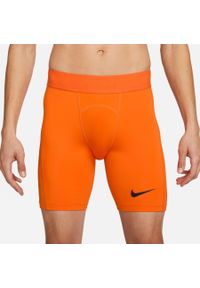 Spodnie treningowe męskie Nike Pro Drifit Strike. Kolor: wielokolorowy, czarny, pomarańczowy. Długość: krótkie. Sport: piłka nożna #1