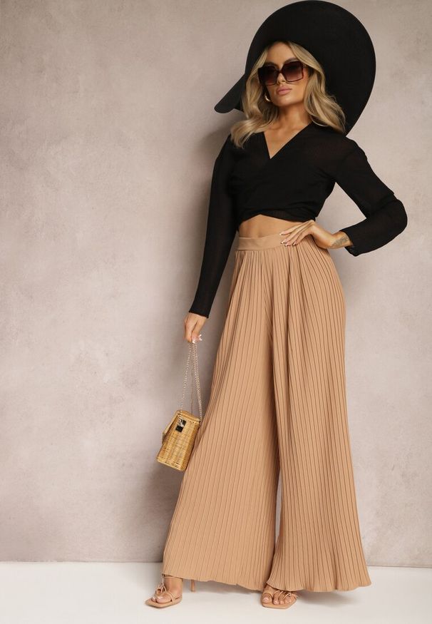 Renee - Beżowe Szerokie Spodnie z Plisami High Waist Mirealli. Stan: podwyższony. Kolor: beżowy