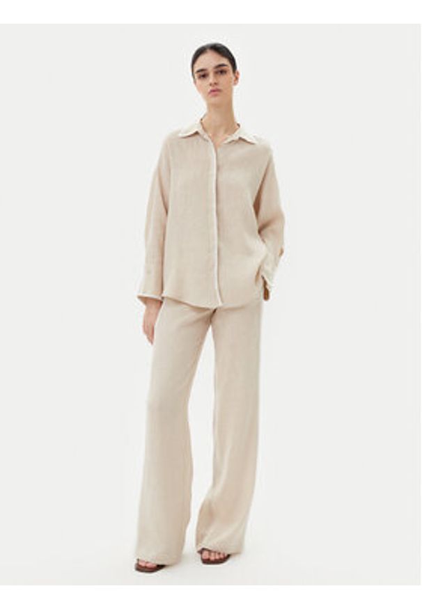 ICONA Spodnie materiałowe RP5LE005 Beżowy Relaxed Fit. Kolor: beżowy. Materiał: len