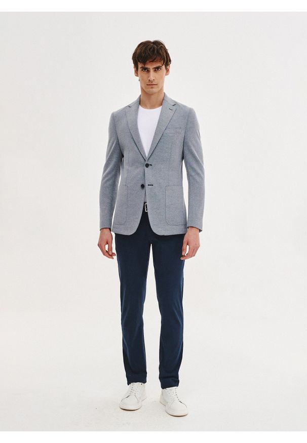 Pako Lorente - PAKO LORENTE - Niebieska marynarka z dzianiny. Kolor: niebieski. Materiał: dzianina. Sezon: wiosna