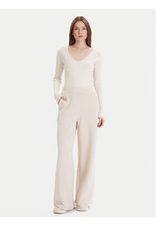 Vero Moda Spodnie dresowe Daisy 10338102 Beżowy Wide Leg. Kolor: beżowy. Materiał: bawełna
