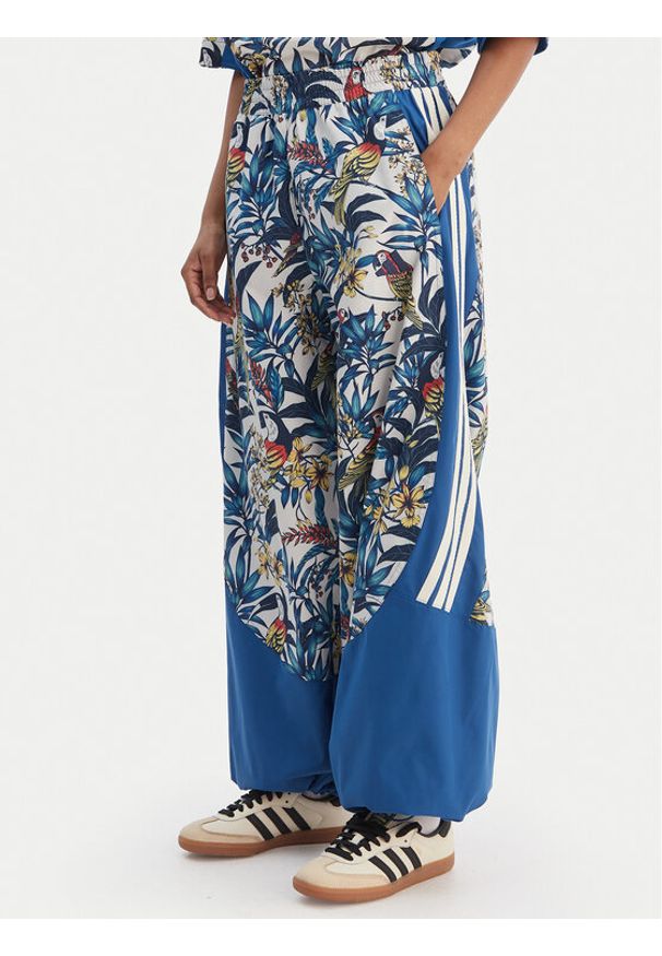 Adidas - adidas Spodnie dresowe Farm Rio Premium KD4643 Niebieski Loose Fit. Kolor: niebieski. Materiał: syntetyk