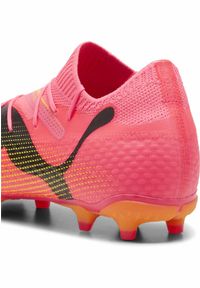 Puma - Buty piłkarskie FUTURE 7 PRO FG/AG PUMA Sunset Glow Black Sun Stream Pink Orange. Kolor: żółty, czarny, pomarańczowy, wielokolorowy. Materiał: syntetyk, tkanina, materiał. Szerokość cholewki: normalna. Sport: piłka nożna