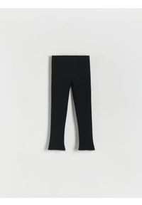 Reserved - Spodnie flare - czarny. Kolor: czarny. Materiał: bawełna, dzianina #1